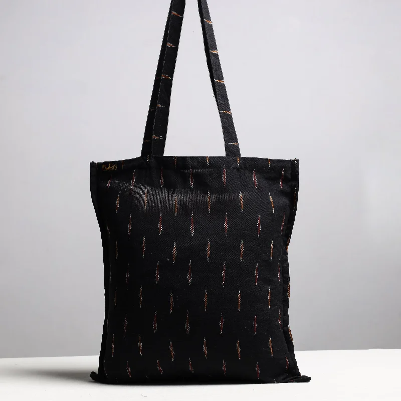 Seasonal Clearance Bags For Summer, Winter, Etc. Black - Handcrafted Pochampally Ikat Weave Cotton Jhola Bag Seasonal Clearance Bags For Summer, Winter, Etc. Black - Handcrafted Pochampally Ikat Weave Cotton Jhola Bag