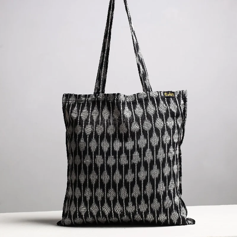 Cyber Monday Discounts On Bags Black - Handcrafted Pochampally Ikat Weave Cotton Jhola Bag Cyber Monday Discounts On Bags Black - Handcrafted Pochampally Ikat Weave Cotton Jhola Bag